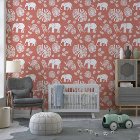 Safari elephant wallpaper transforming children's bedroom with tropical foliage and warm terracotta tones