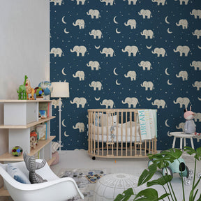 Blue elephant mural wallpaper transforming toddler room into dreamy night sky sanctuary