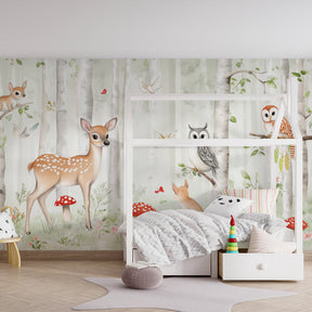 Serene baby bedroom with enchanted forest mural wallpaper creating magical woodland atmosphere