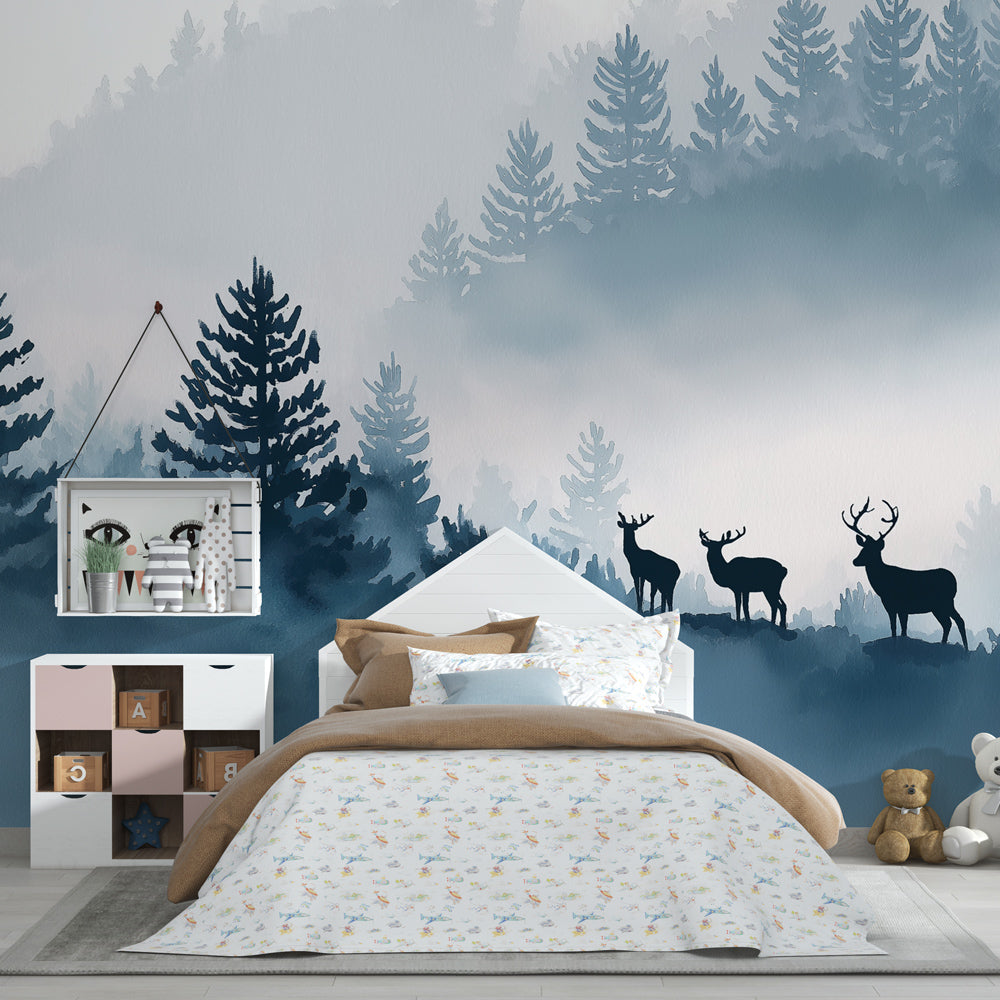 Mystical forest wallpaper with deer in misty blue setting for kids playroom decor