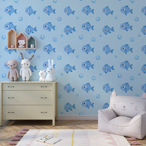 Ocean-themed fish wallpaper creating aquatic atmosphere in children's bedroom