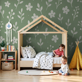 Delicate floral mural wallpaper creating serene nursery atmosphere with white flowers and green foliage by Kids-Mundo