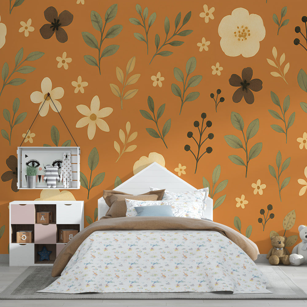 Warm orange floral mural wallpaper with green leaves creating cozy kids playroom atmosphere
