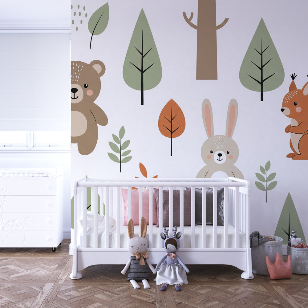 Woodland themed mural wallpaper creating magical children's bedroom with forest animals