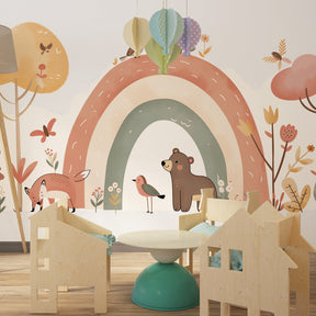 Pastel forest animals mural wallpaper transforming playroom into woodland sanctuary