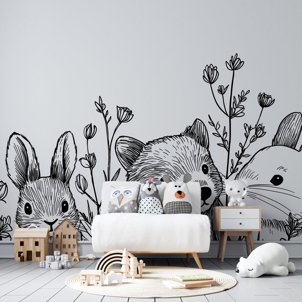 Monochrome forest animals mural wallpaper transforming toddler room into enchanting woodland sanctuary