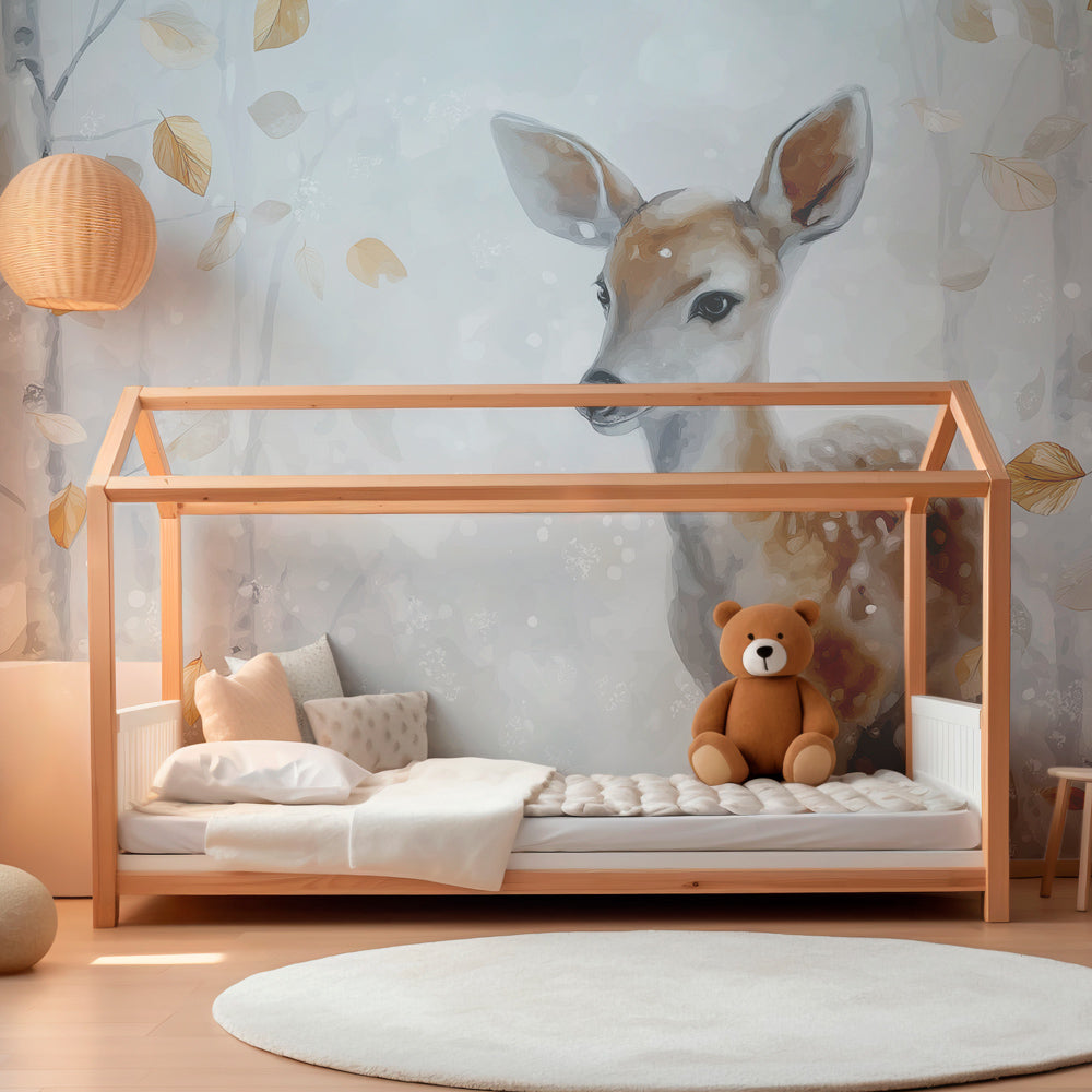 Serene forest deer wallpaper creating cozy reading nook for kids with nature-inspired decor