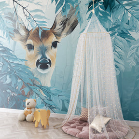 Mystical woodland fawn wallpaper in modern children's bedroom with natural wood furniture