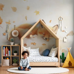 Sleeping fox mural wallpaper with autumn leaves in cozy children's nursery by Kids-Mundo