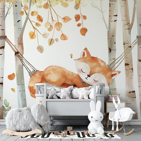 Autumn fox wallpaper creating cozy woodland atmosphere in children's bedroom with birch trees