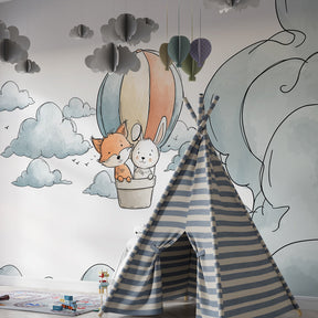 Fox and rabbit hot air balloon wallpaper creating magical atmosphere in children's bedroom