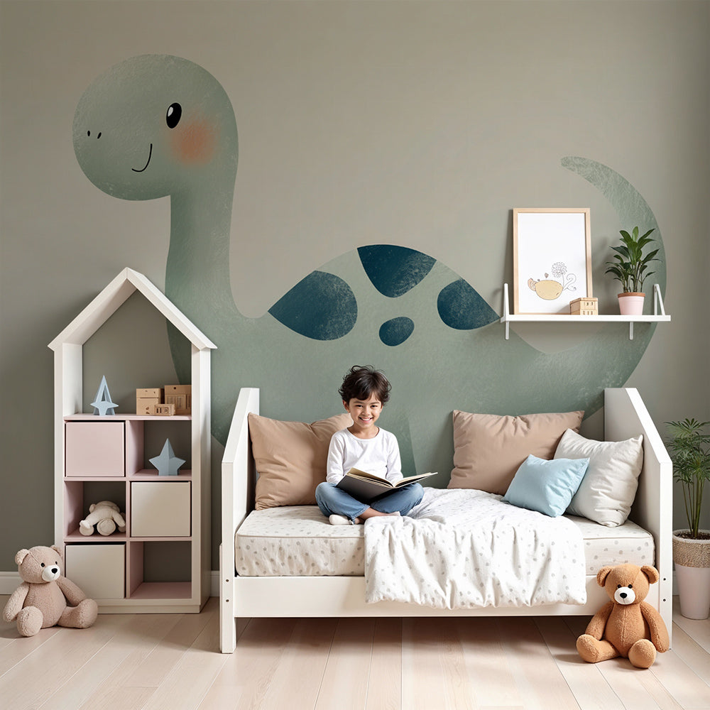 Kids-Mundo friendly green dinosaur wall mural in a soft neutral nursery with a cot and shelving