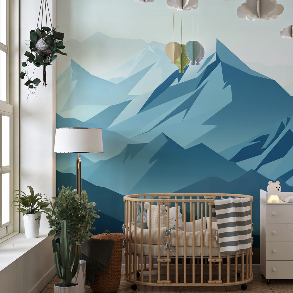 Modern geometric mountain wallpaper transforming kids playroom with soothing blue tones