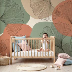 Ginkgo leaves mural wallpaper creating modern botanical nursery decor with natural wood furniture by Kids-Mundo