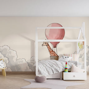 Enchanting cloud and giraffe mural wallpaper transforming toddler bedroom by Kids-Mundo
