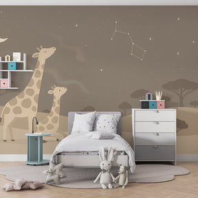 Starry night giraffe mural wallpaper transforming children's playroom into magical African safari scene