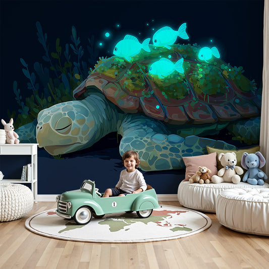 Kids-Mundo turtle wall mural in a dark nursery with a cot beneath glowing reef fish