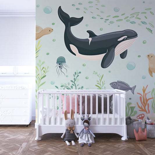 Kids-Mundo whale and turtle wall mural behind a bed in a fresh kids bedroom