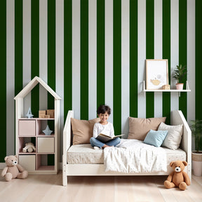 Green and white vertical stripe mural wallpaper in modern nursery with natural wood furniture by Kids-Mundo