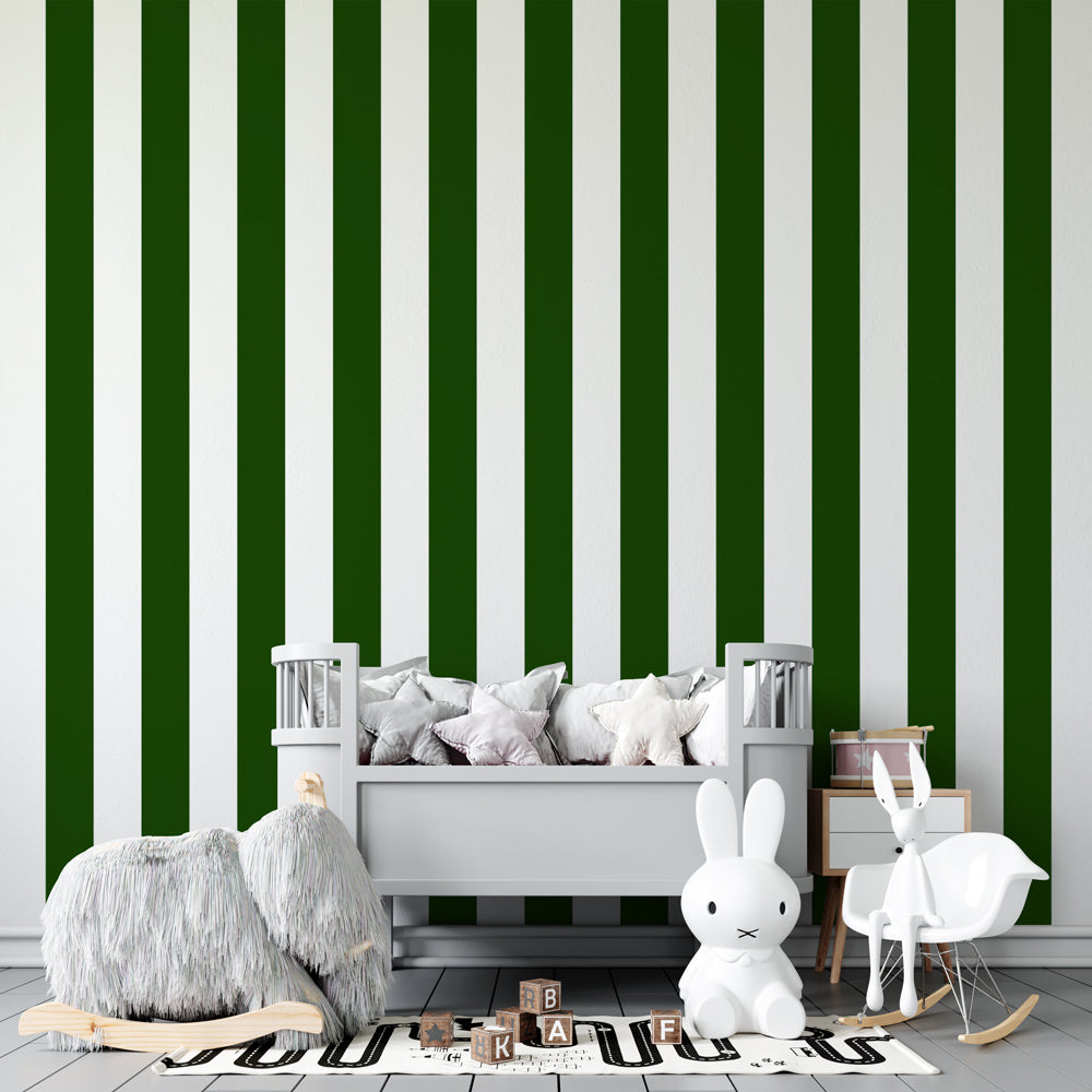 Vertical green and white stripe wallpaper accent wall in bright kids playroom setting