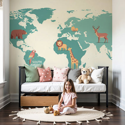 Kids-Mundo green world map wall mural in a warm cream nursery with cot and toys