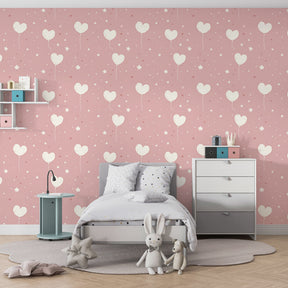 Pink balloon wallpaper creating dreamy atmosphere in children's bedroom