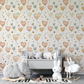 Heart balloon mural wallpaper creating magical playroom atmosphere with golden star accents