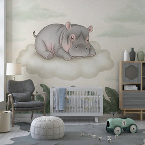 Dreamy hippo cloud wallpaper in modern children's bedroom with natural wood furniture and soft lighting