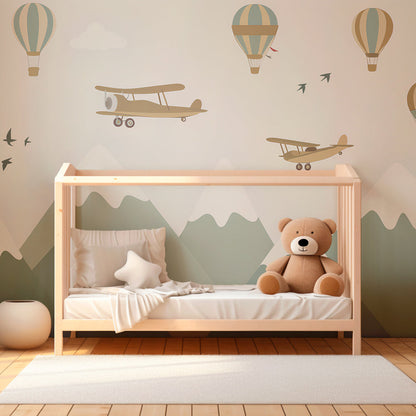 Kids-Mundo balloons and biplanes mural styled on an adventure-themed kids bedroom wall
