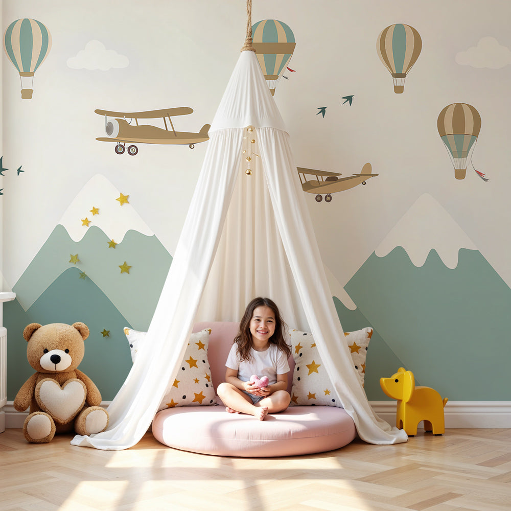 Kids-Mundo hot air balloon mountain wall mural in a soft green travel nursery