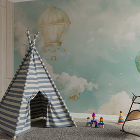 Dreamy hot air balloon wallpaper in children's bedroom with soothing blue tones and stars