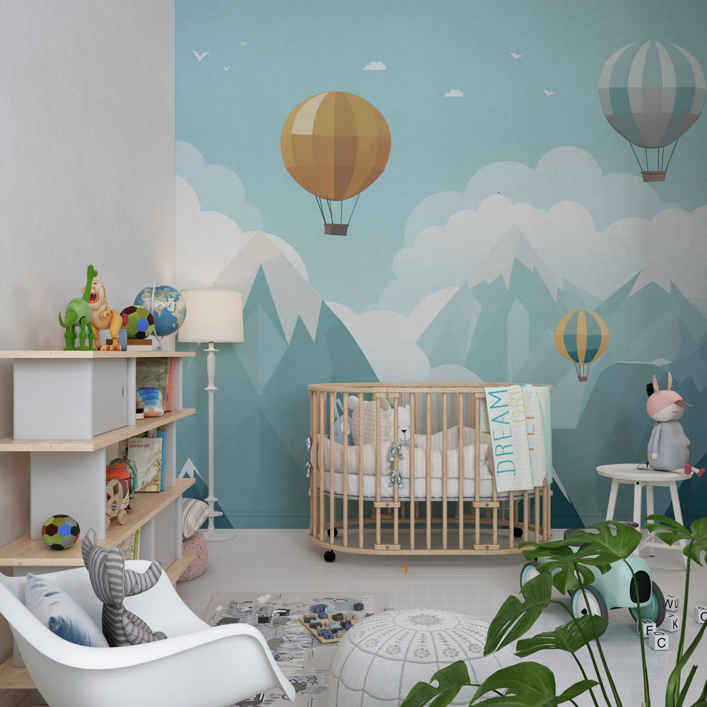 Sky-themed mural wallpaper creating dreamy children's bedroom with floating balloons and mountains