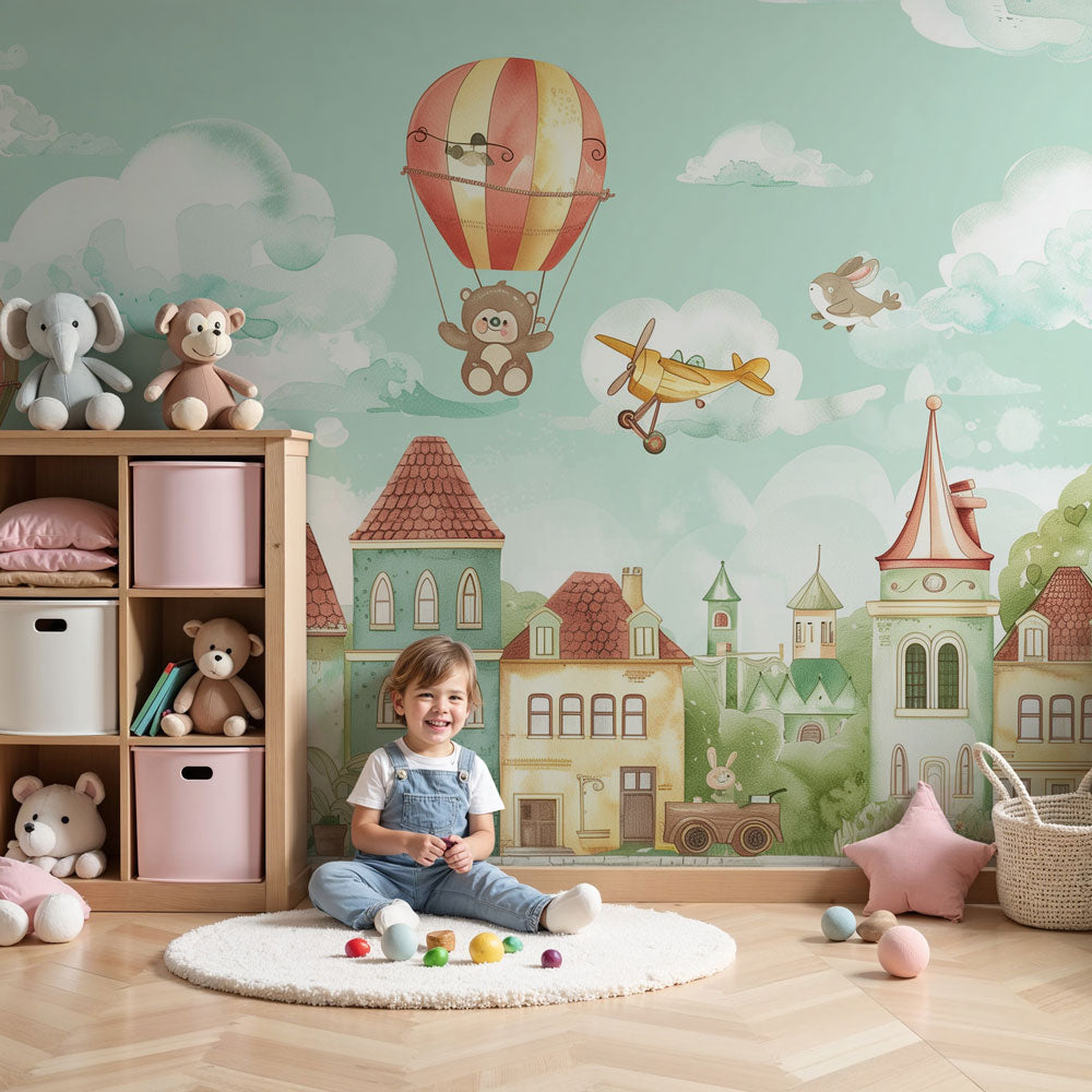 Hot air balloon mural wallpaper in bright nursery with enchanted village theme by Kids-Mundo