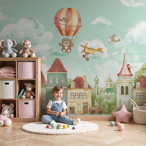 Hot air balloon mural wallpaper in bright nursery with enchanted village theme by Kids-Mundo