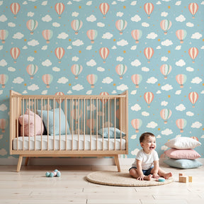 Hot air balloon mural wallpaper creating dreamy nursery decor with pastel sky theme by Kids-Mundo