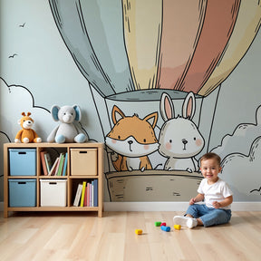 Hot air balloon mural wallpaper with fox and rabbit in cozy nursery room by Kids-Mundo