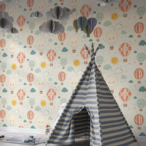 Whimsical balloon mural wallpaper for kids playroom with clouds and smiling sun elements
