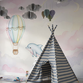 Whimsical balloon and dolphin wallpaper transforming kids playroom space