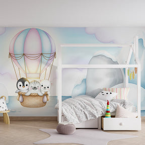 Whimsical hot air balloon wallpaper with penguin seal bear for toddler room by Kids-Mundo