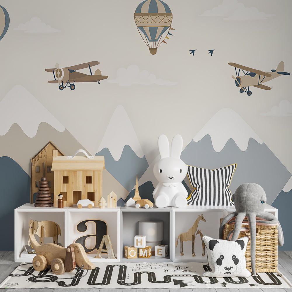 Kids-Mundo mountain balloon wall mural adding adventure to a bright playroom wall.