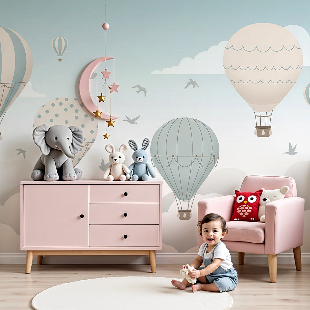 Kids-Mundo hot air balloons wall mural styled above a cot in a calm, pale blue nursery.