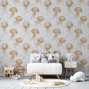 Marine jellyfish wallpaper with golden details on clean white wall in children's room