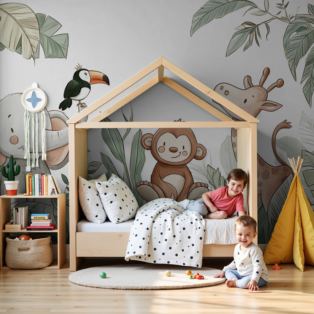 Kids-Mundo jungle animal friends wall mural in a bright nursery beside a white changing table