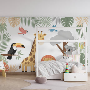 Colorful jungle themed mural wallpaper with toucan and koala in children's playroom by Kids-Mundo