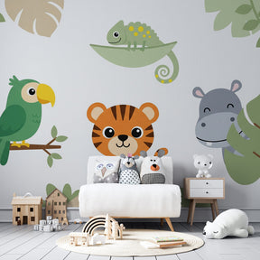 Colorful jungle wallpaper featuring tiger, parrot and hippo in bright kids playroom setting