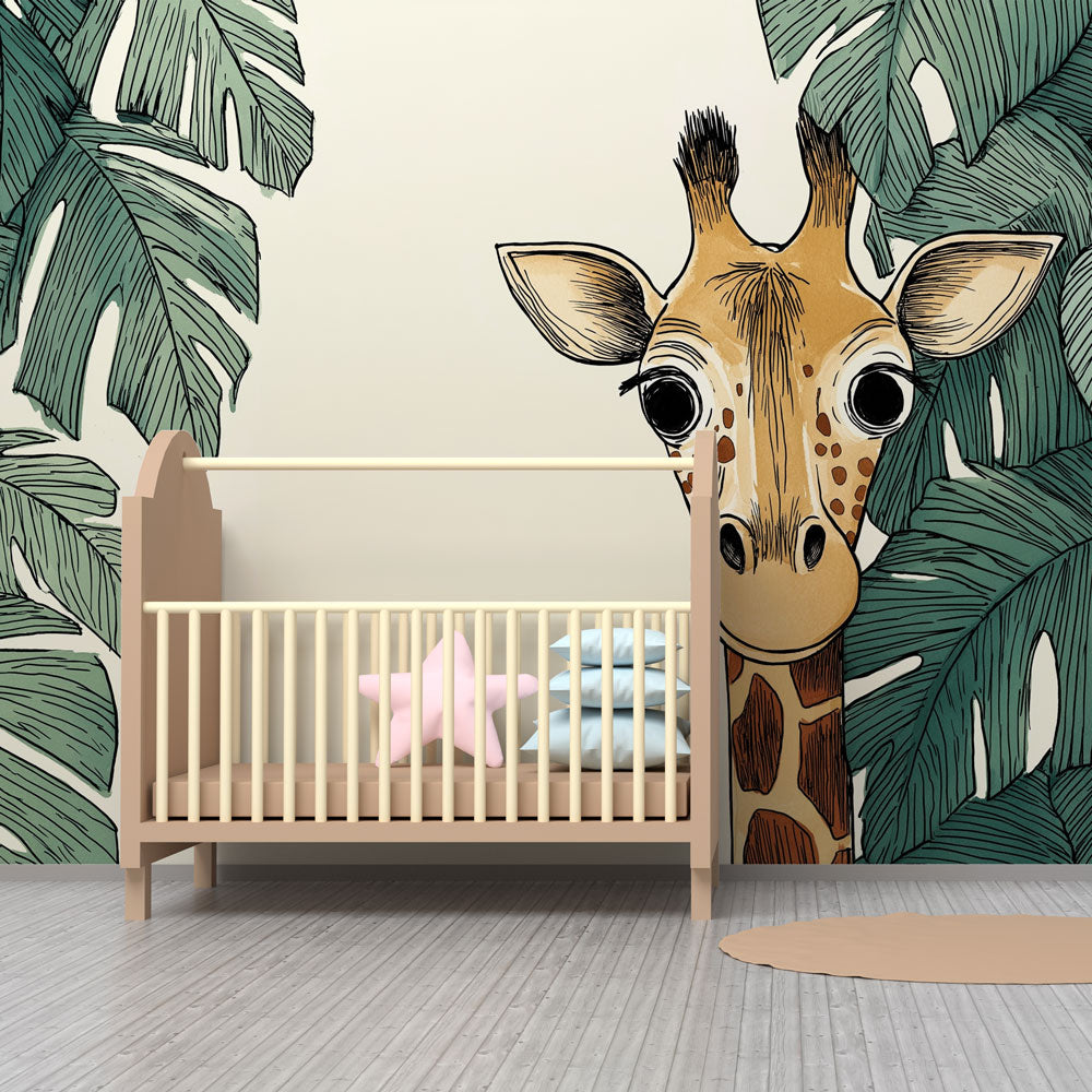 Curious giraffe mural wallpaper for children's playroom with lush jungle foliage by Kids-Mundo