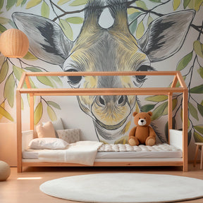 Safari giraffe wallpaper creating peaceful nursery atmosphere with soft natural lighting