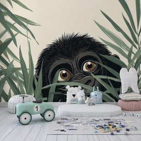 Baby gorilla mural wallpaper creating peaceful jungle atmosphere in toddler bedroom