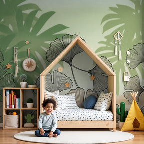 Delicate ginkgo leaves mural wallpaper creating serene jungle atmosphere in modern nursery by Kids-Mundo