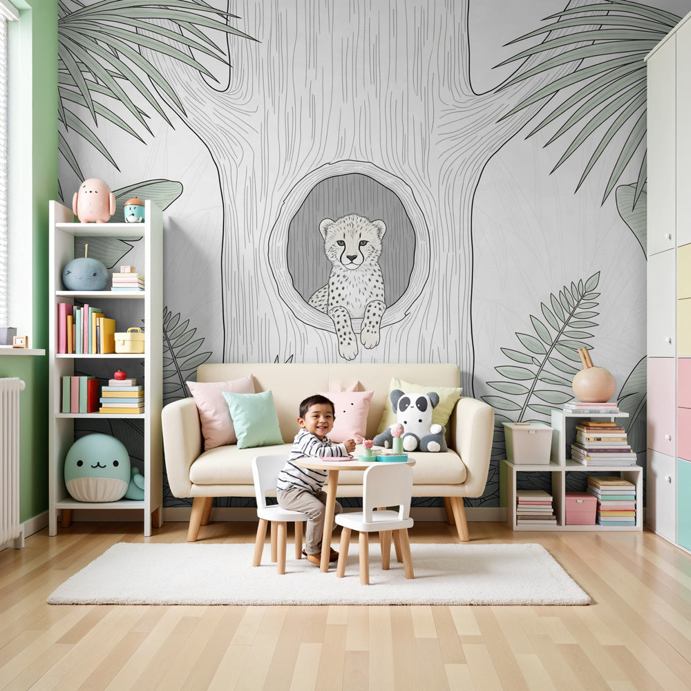 Jungle leopard mural wallpaper creating tropical nursery atmosphere with baby leopard in tree by Kids-Mundo
